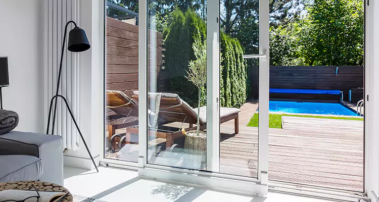 Fixing A Sliding Screen Door Roller in Iona, FL